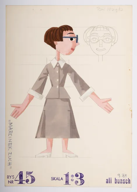 Pani Magda – Projekt kobiety o krótkich, brązowych włosach, w owalnych ciemnoniebieskich okularach, z głową zwróconą w prawa stronę, w szaro-beżowej garsonce.